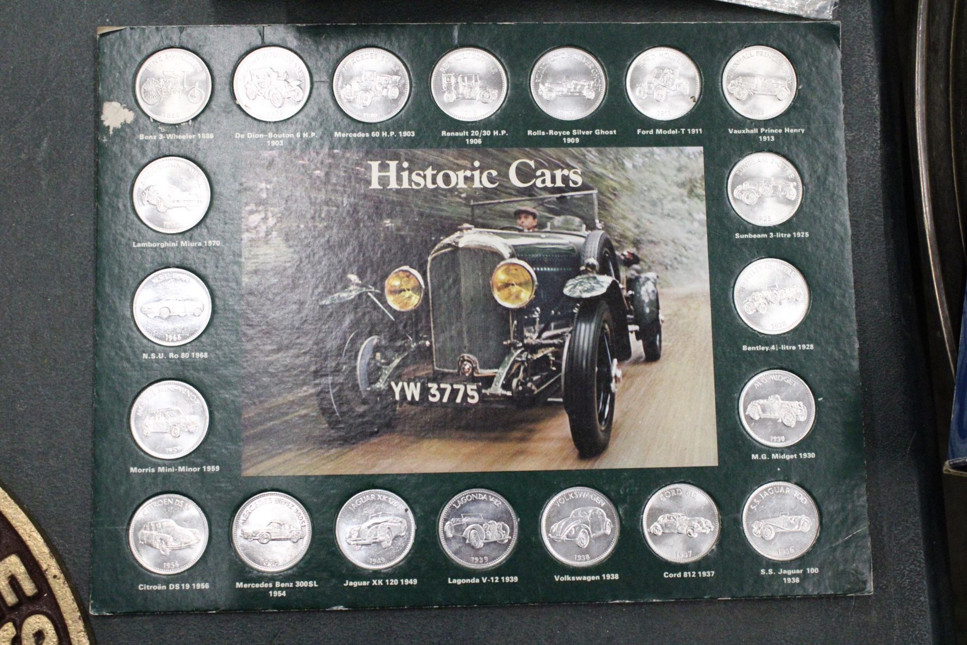 THREE SETS OF SHELL COLLECTABLE COINS ON CARDS, TO INCLUDE MAN'S FIRST FLIGHT X 2 AND HISTORIC CARS - Image 4 of 7