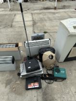 A LARGE ASSORTMENT OF ITEMS TO INCLUDE HEATERS, A LAMP AND DVD AND VHS PLAYERS ETC