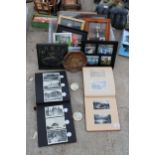 AN ASSORTMENT OF FRAMED PRINTS AND TWO PHOTO ALBUMS