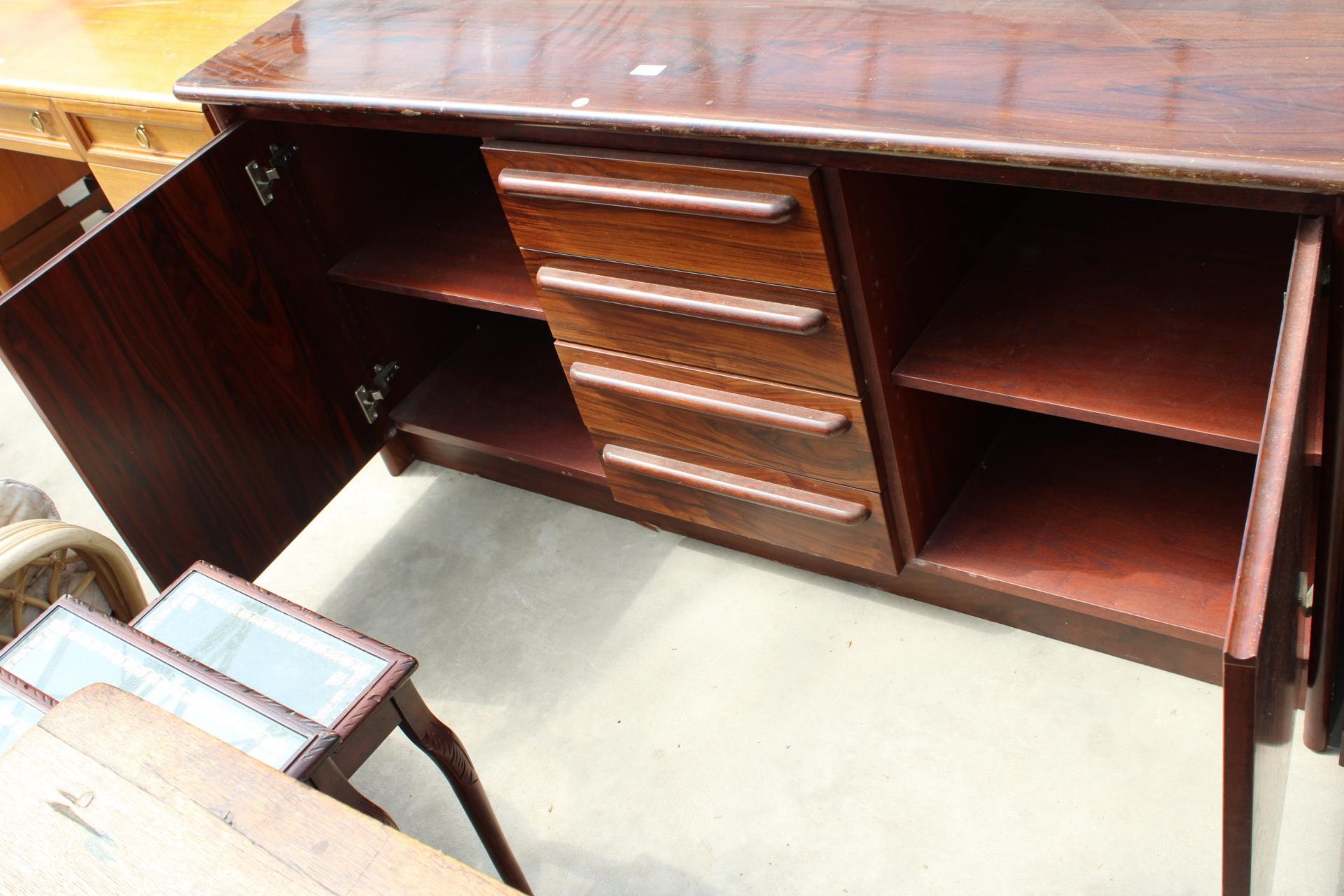 A RETRO HARDWOOD SIDEBOARD ENCLOSING 4 DRAWERS, 2 CUPBOARDS, 63" WIDE - Image 3 of 3