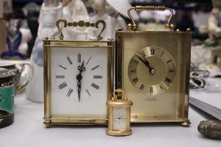 TWO BRASS CARRIAGE CLOCKS PLUS A MINIATURE CARRIAGE CLOCK