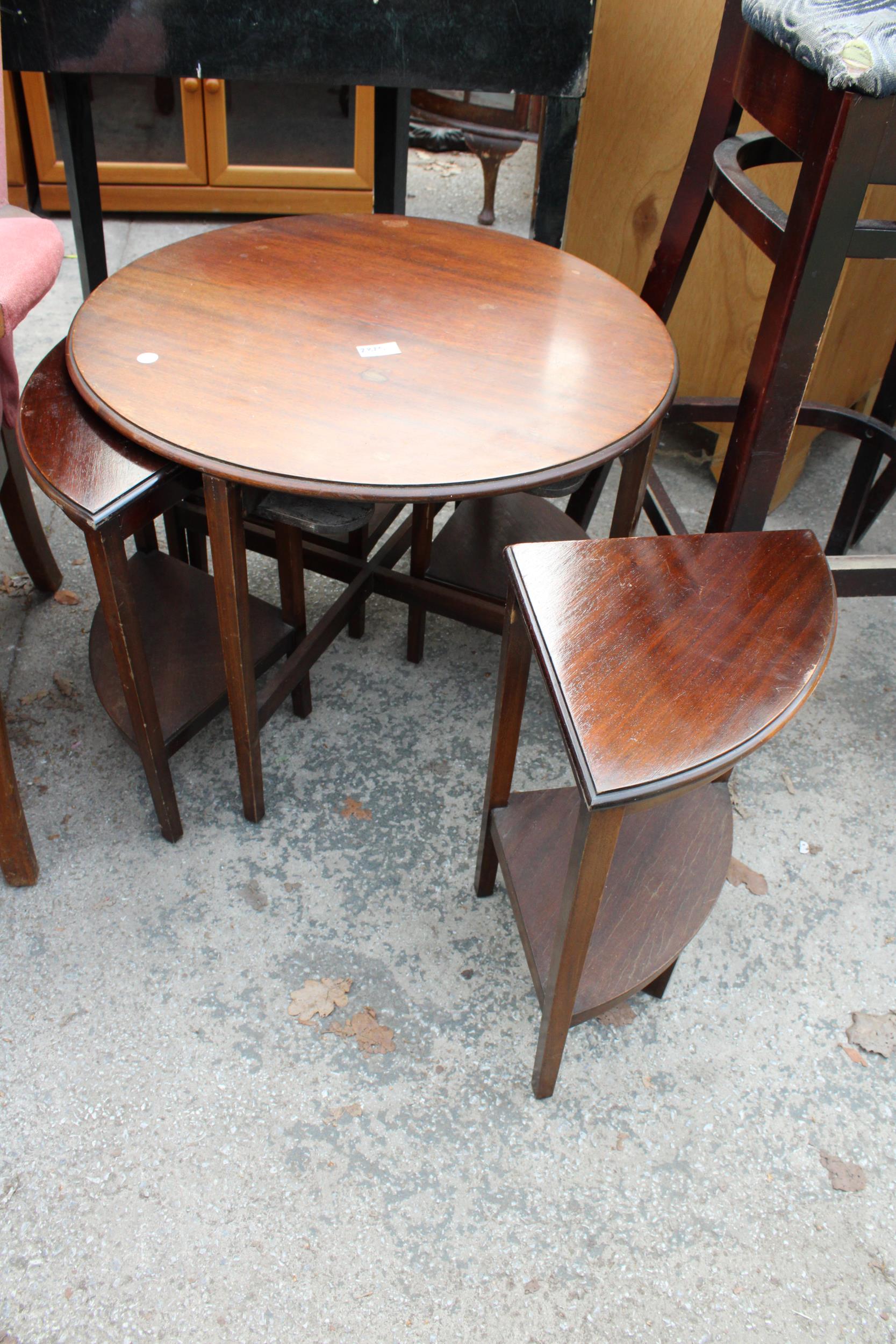 A MID 20TH CENTURY 23.5" DIAMETER NEST OF FIVE TABLES - Image 2 of 3
