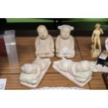 FOUR ORIENTAL STYLE CARVED WOODEN CHILDREN