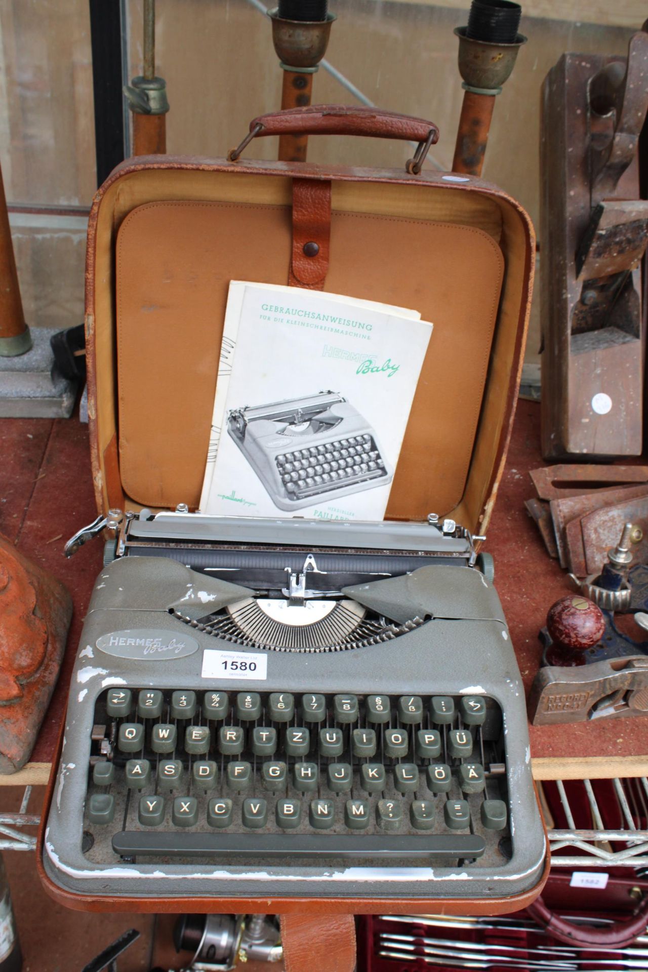 A HERMES BABY TYPEWRITER WITH CARRY CASE