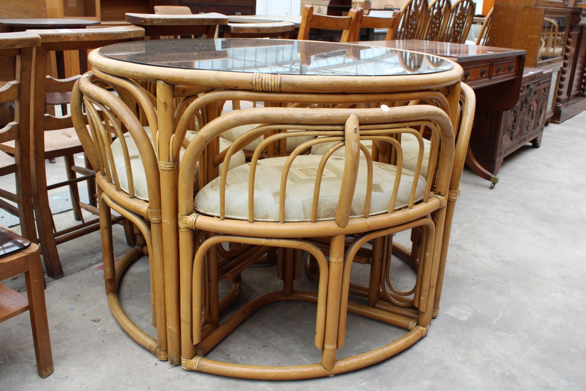 A MODERN 41" DIAMETER BAMBOO AND WICKER DINING TABLE WITH SMOKED GLASS TOP AND FOUR DINING CHAIRS - Image 2 of 6