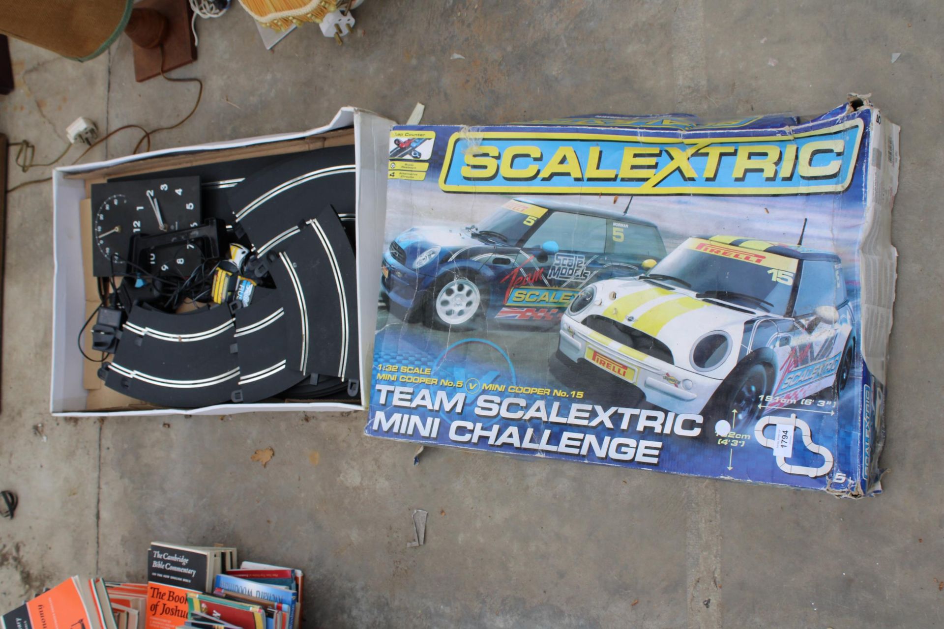 A SCALEXTRIC SET COMPLETE WITH TWO CARS