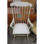 A MODERN WHITE PAINTED SPINDLE BACK ROCKING CHAIR