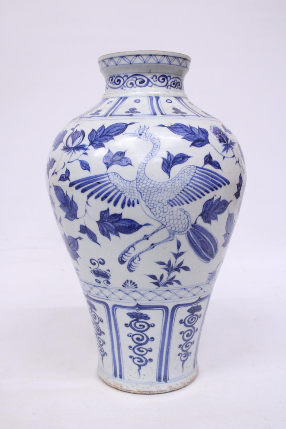 A LARGE CHINESE MING STYLE BLUE AND WHITE POTTERY MEIPING VASE DECORATED WITH CRANES IN FLIGHT - - Image 3 of 5