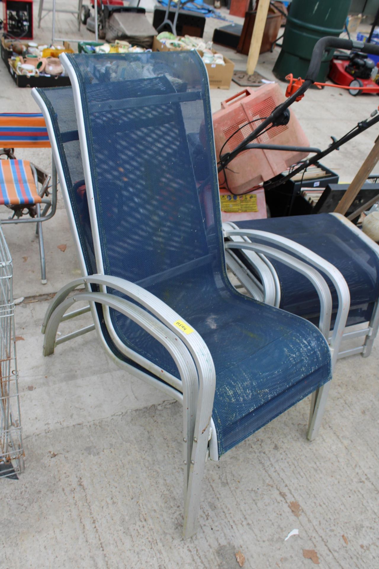 TWEO METAL STACKING GARDEN CHAIRS AND TWO FOOT STOOLS - Image 2 of 3