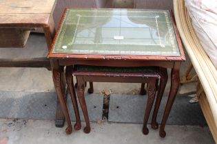 A MODERN NEST OF THREE TABLES ON CABRIOLE LEGS