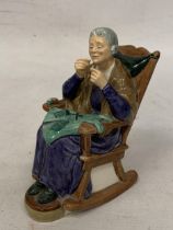 A ROYAL DOULTON FIGURINE "A STITCH IN TIME" HN 2352