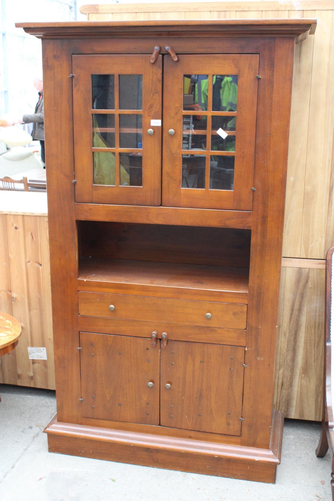 A HARDWOOD CUPBOARD WITH GLAZED UPPER PORTION, SINGLE DRAWER AND CUPBOARD TO BASE, 43" WIDE
