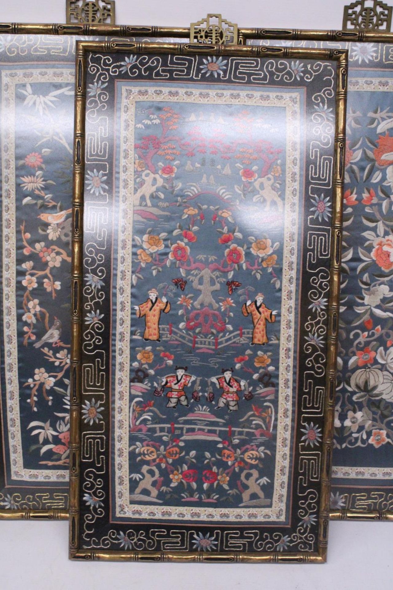 THREE CHINESE SILK EMBROIDERIES DEPICTING A LANDSCAPE SCENE, BIRDS AND FLORALS IN BAMBOO FRAMES - Image 2 of 7