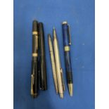 FIVE VARIOUS PENS AND PENCILS TO INCLUDE A WATERMANS FOUNTAIN PEN WITH 9CT GOLD BANDS AND A 14CT