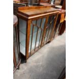 A MID 20TH CENTURY WALNUT TWO DOOR DISPLAY CABINET ON CABRIOLE LEGS, 47" WIDE