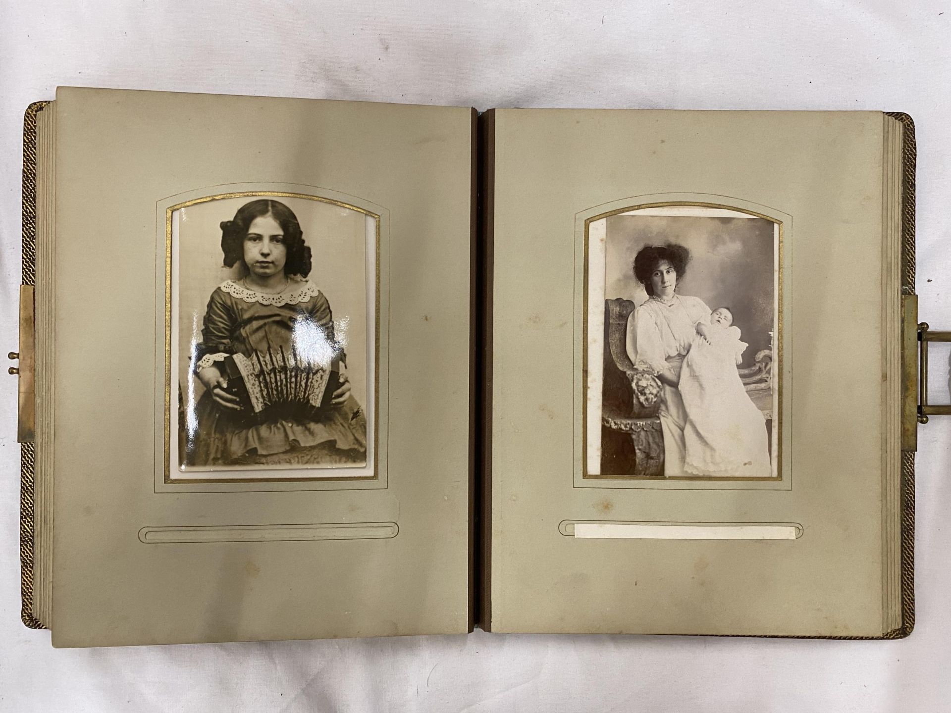 A VICTORIAN LEATHERBOUND PHOTO ALBUM CONTAINING PHOTO'S - Image 9 of 11