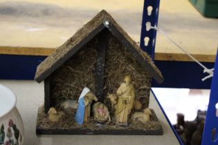 A VINTAGE CHRISTMAS WOODEN MANGER WITH FIGURES