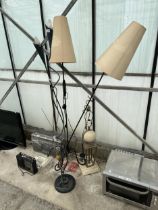 THREE VARIOUS STANDARD LAMPS AND A DECORATIVE TABLE LAMP
