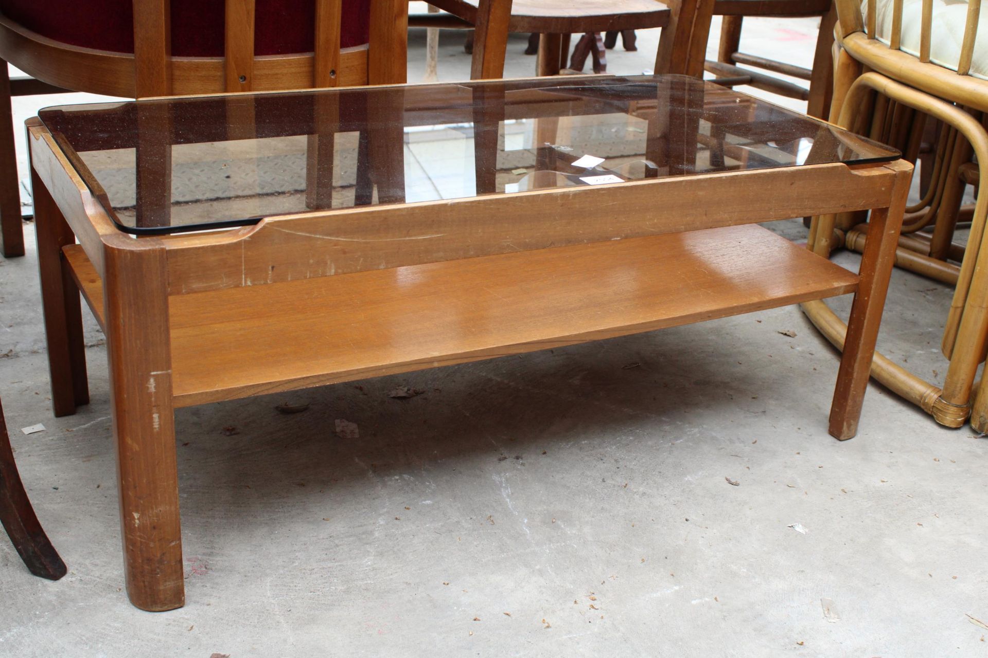A RETRO TEAK TWO TIER COFFEE TABLE WITH SMOKED GLASS TOP, 34" X 17" - Image 2 of 3