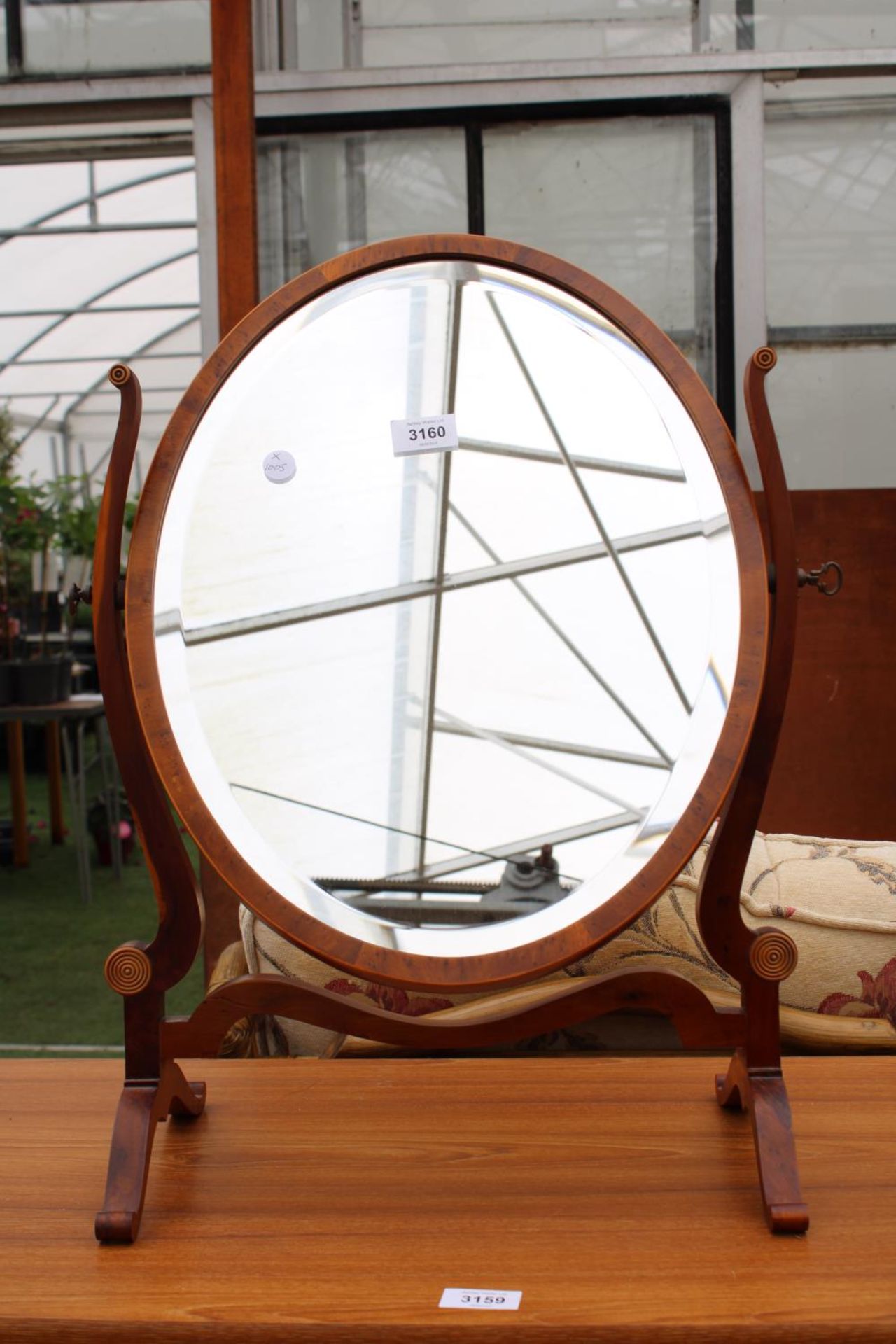 A 19TH CENTURY STYLE SWING FRAME YEW WOOD MIRROR -