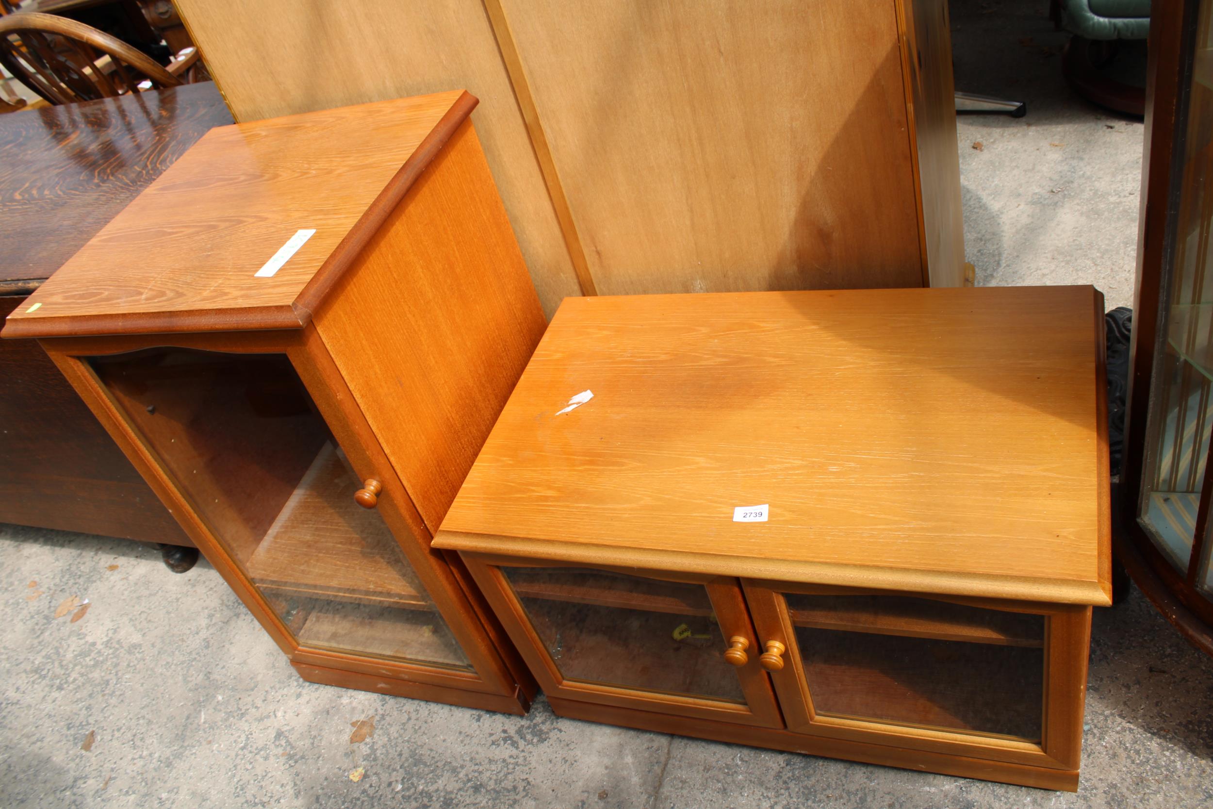 A RETRO TEAK SUTCLIFFE CABINET AND STAND