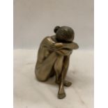 A BRONZE COLOURED ART DECO NUDE ORNAMENT - APPROXIMATELY 16CM HIGH