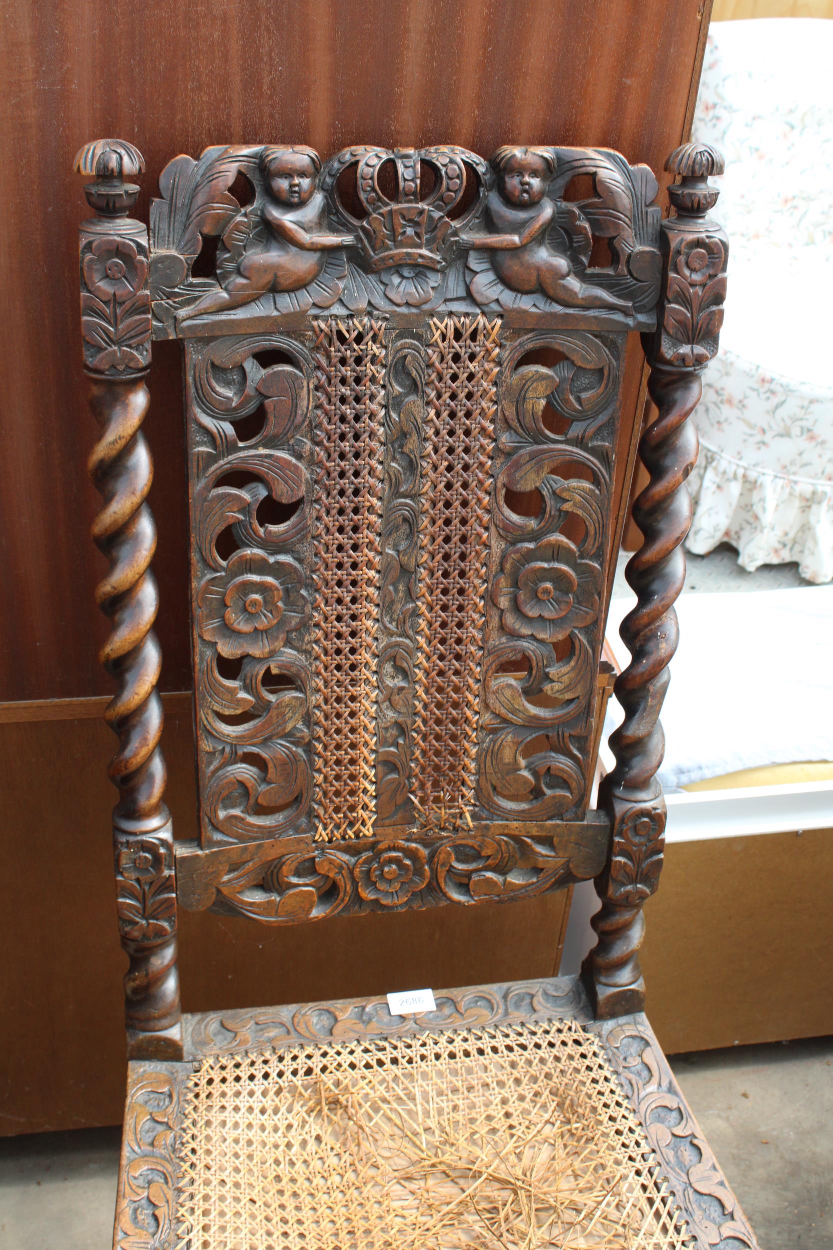 AN OAK JACOBEAN STYLE DINING CHAIR WITH BARLEY-TWIST UPRIGHTS AND STRETCHERS - Image 2 of 3