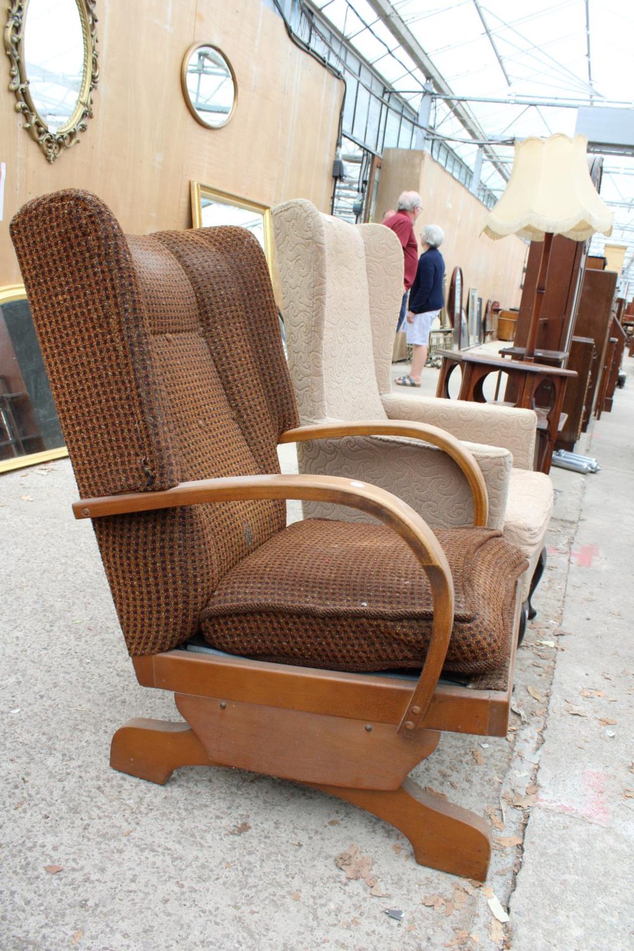 AN ART DECO STYLE ROCKING CHAIR AND WINGED FIRESIDE CHAIR ON CABRIOLE LEGS - Image 2 of 3