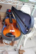 A VIOLIN WITH CARRY CASE AND BOW FOR RESTORATION