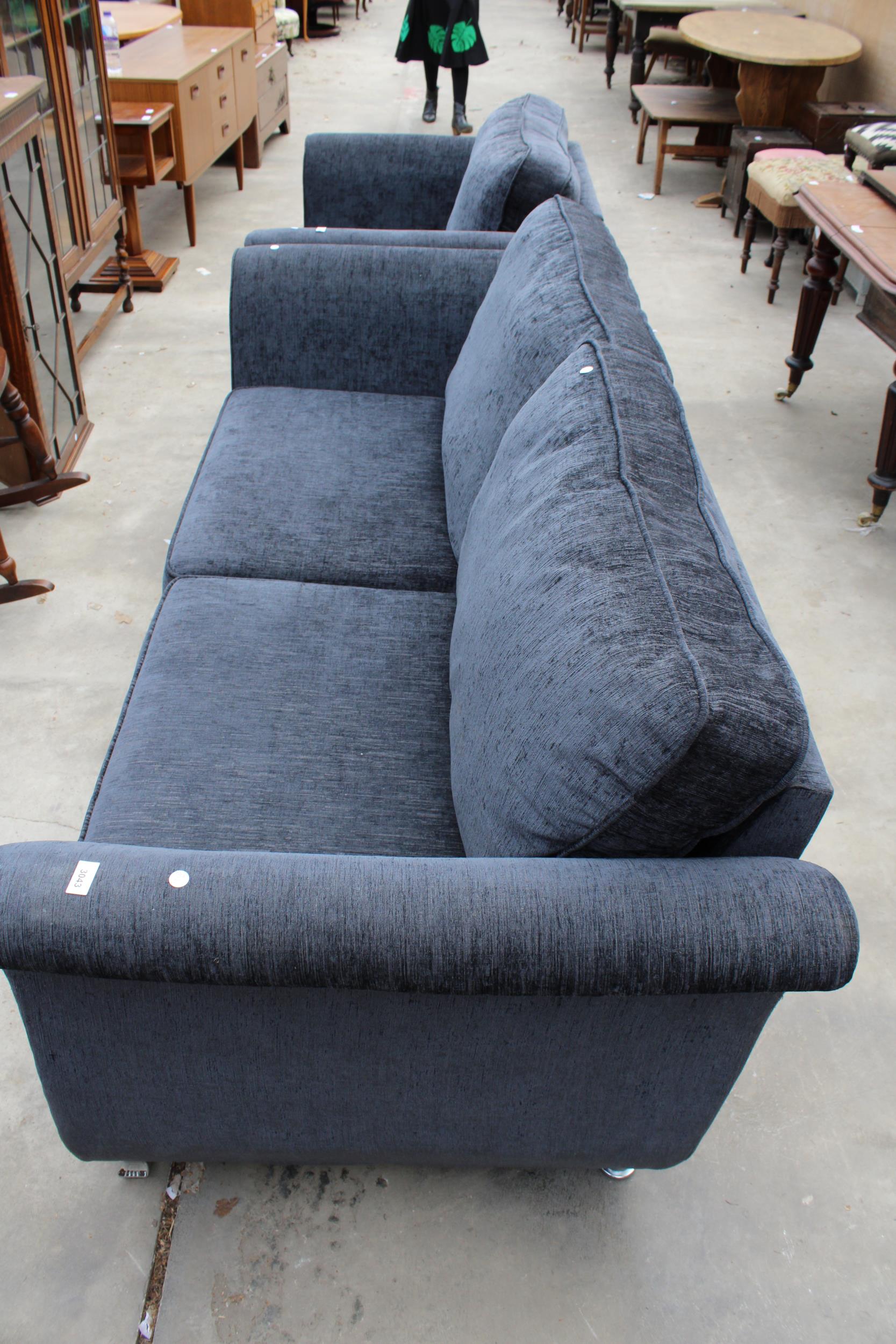 A MODERN SLATE GREY THREE SEATER SETTEE WITH POLISHED CHROME BUTTONED ARMS AND LEGS - Image 2 of 4