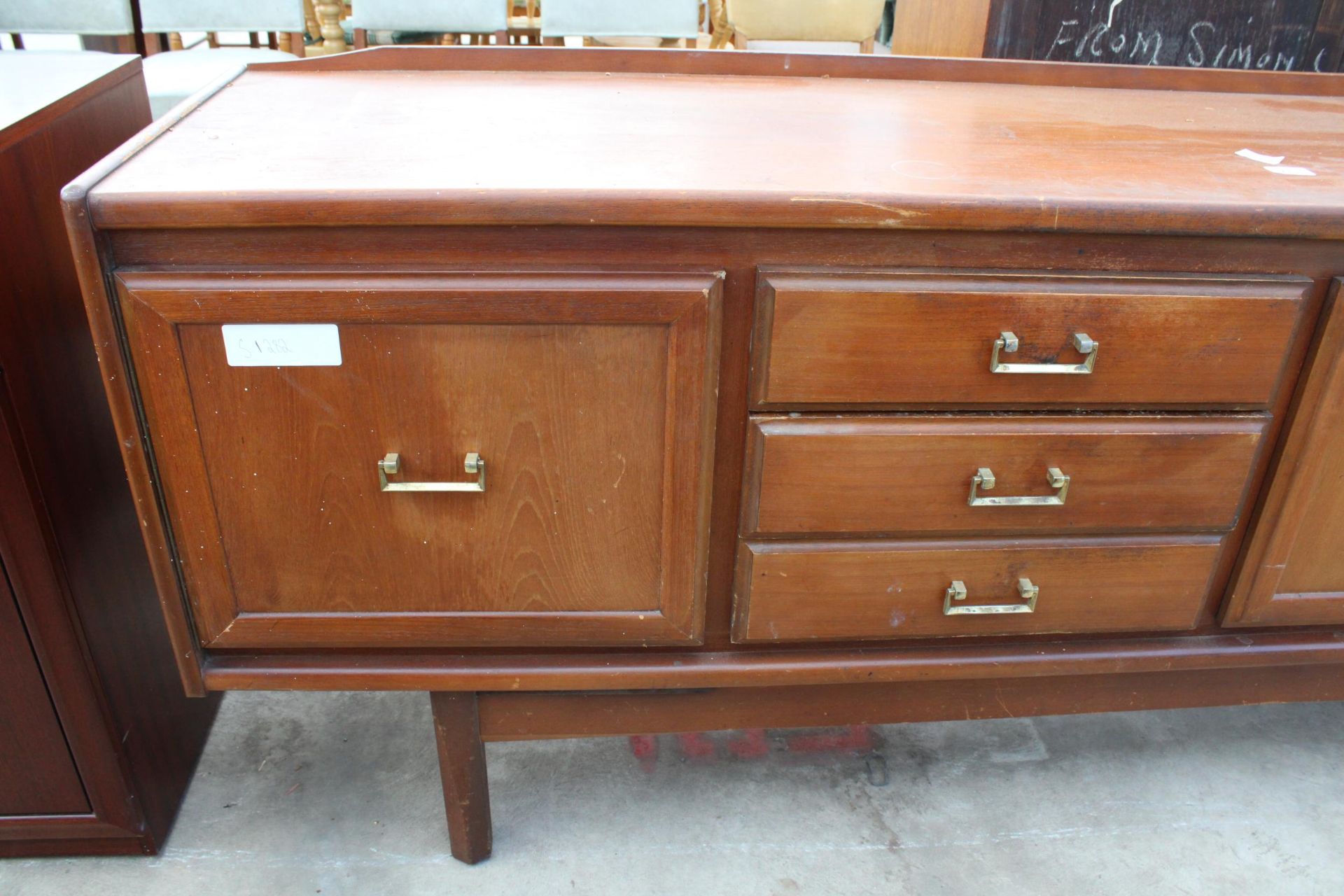 A RETRO TEAK SIDEBOARD ENCLOSING THREE DRAWERS AND THREE CUPBOARDS, 78" WIDE - Image 3 of 4