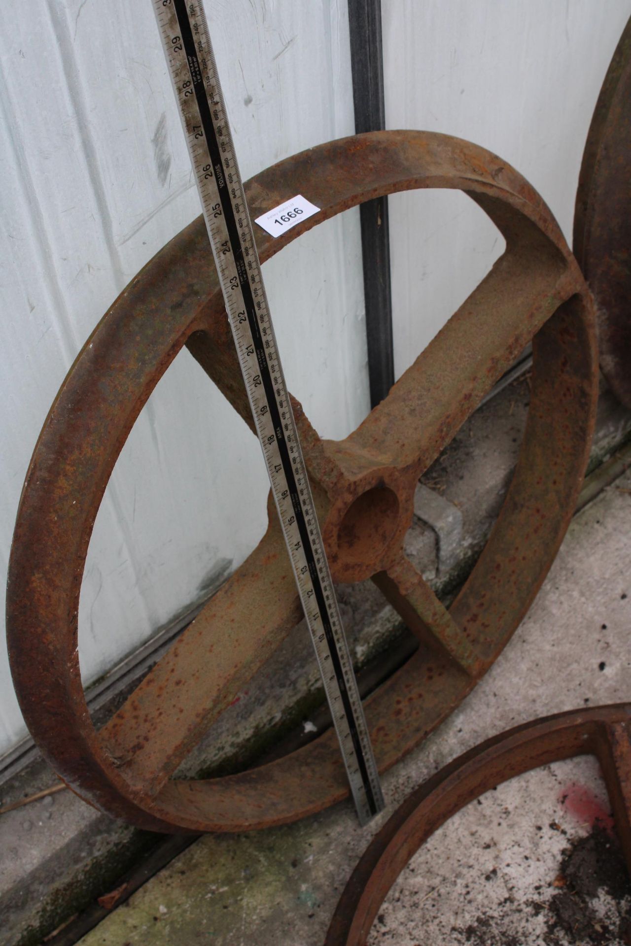 A PAIR OF VINTAGE CAST IRON TRAIN WHEELS - Image 2 of 2