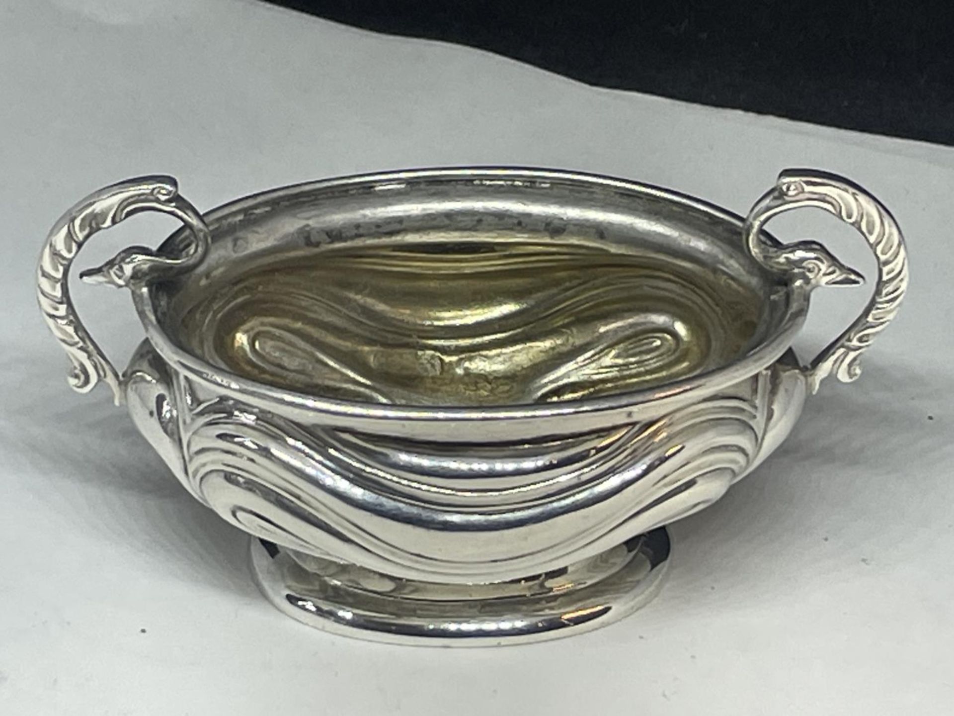 A HALLMARKED BIRMINGHAM SILVER TWIN HANDLED OVAL SALT GROSS WEIGHT 43.5 GRAMS