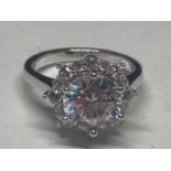 A WHITE METAL RING WITH 3 CARATS OF MOISSANITE SIZE N