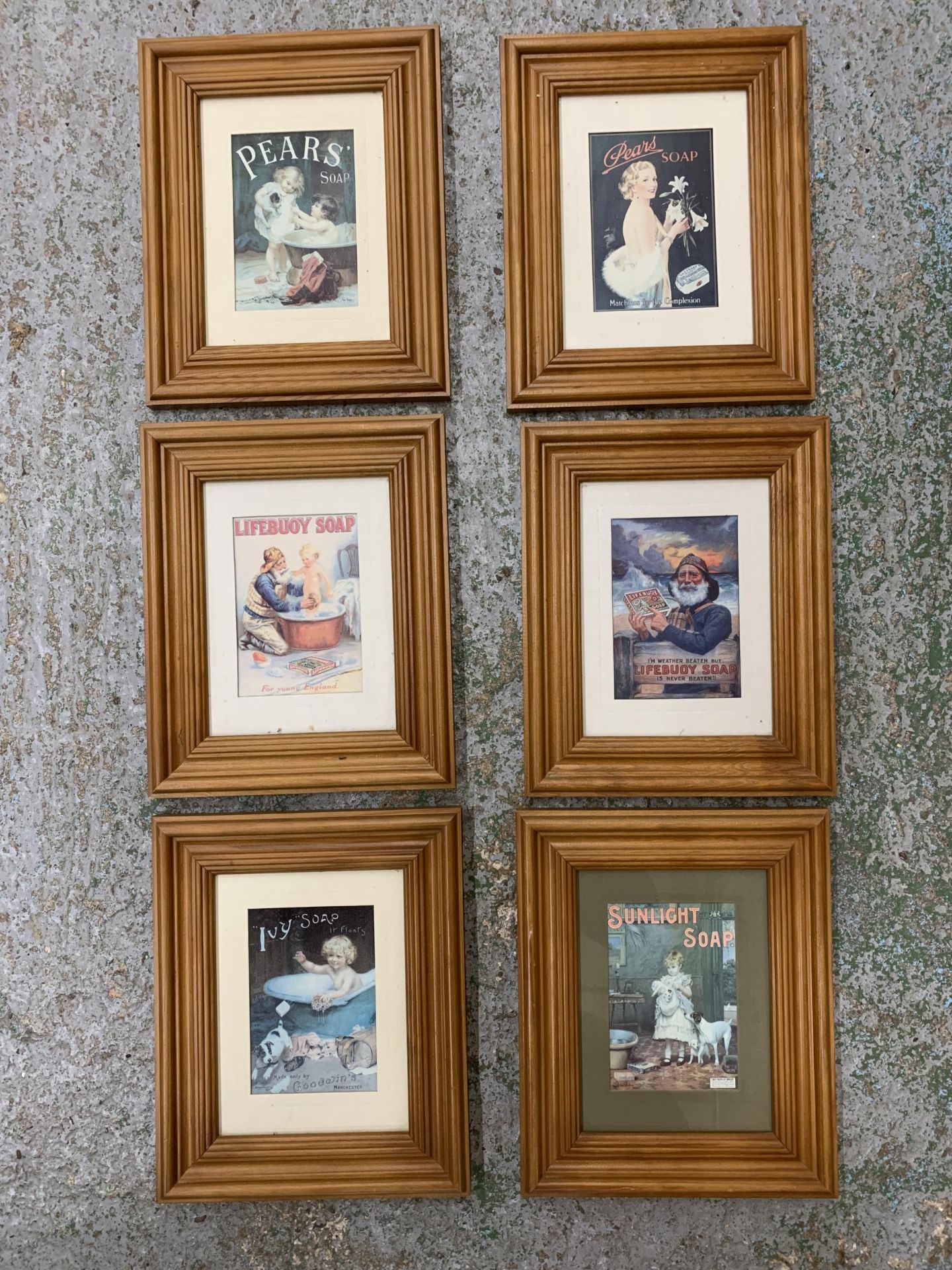 SIX FRAMED VINTAGE ADVERTISING SOAP PICTURES TO INCLUDE LIFEBUDY SOAP, IVY SOAP, SUNLIGTH SOAP AND