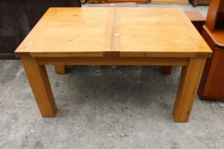 A MODERN OAK EXTENDING DINING TABLE 55" X 36" (LEAF 15.5) ON SQUARE LEGS