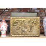 A VINTAGE BRASS MAGAZINE RACK WITH GALLEONS IMAGE