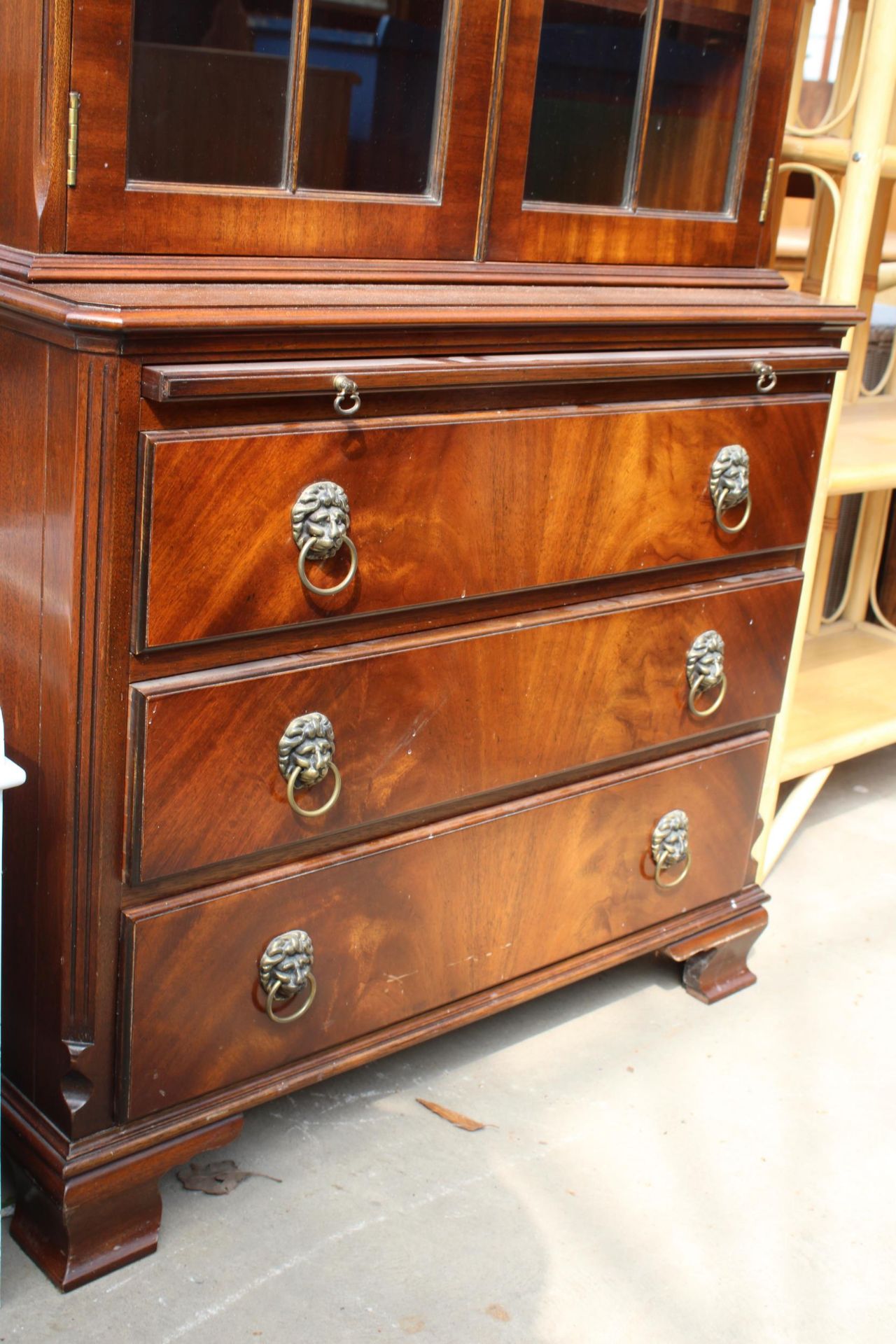 A MAHOGANY REPRODUX, BEVAN FUNNELL TWO DOOR BOOKCASE ON BASE WITH THREE DRAWERS AND SLIDE, 30" - Image 3 of 5