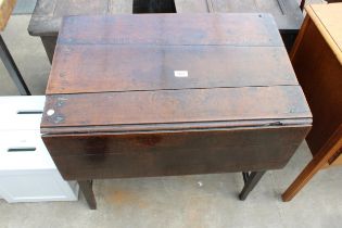 A GEORGE III OAK DROP-LEAF TABLE