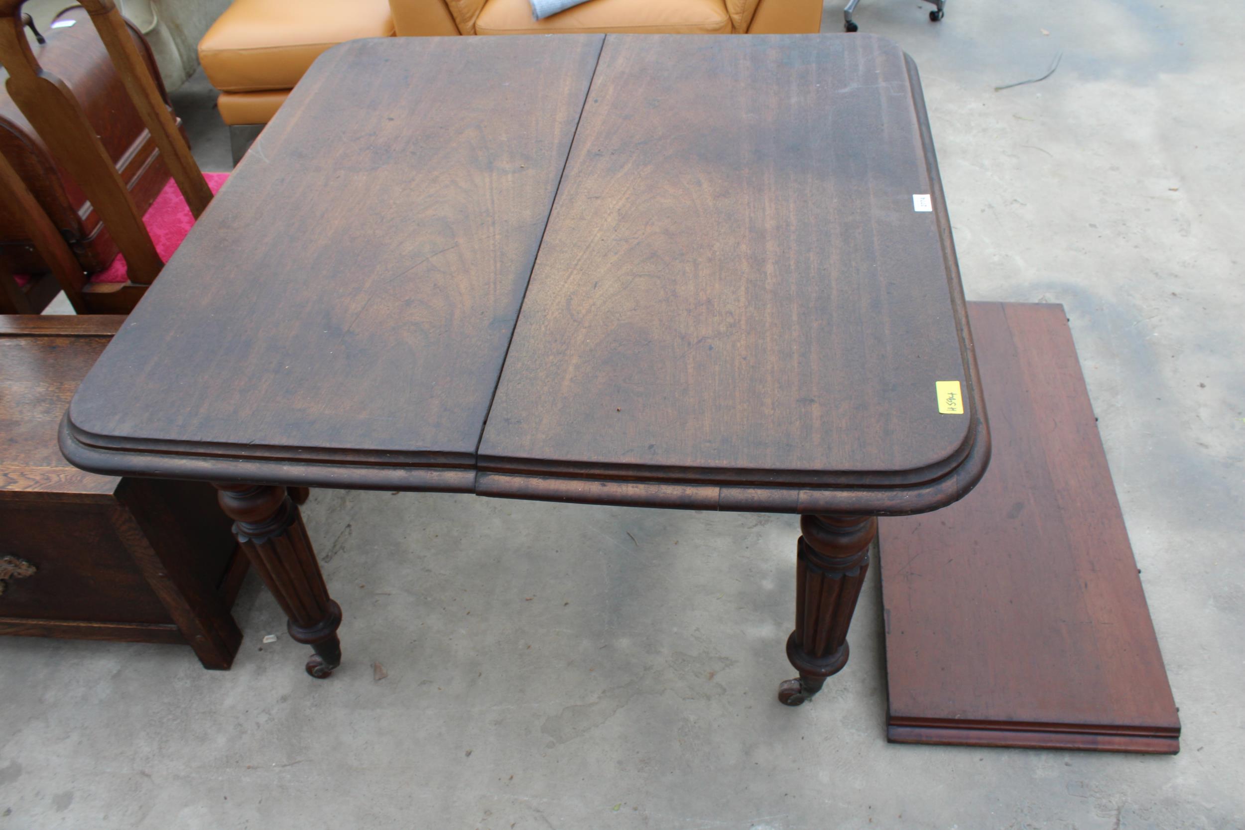 A VICTORIAN MAHOGANY WIND-OUT DINING TABLE ON FLUTED LEGS, 41" SQUARE (LEAF 17") COMPLETE WITH - Image 3 of 3