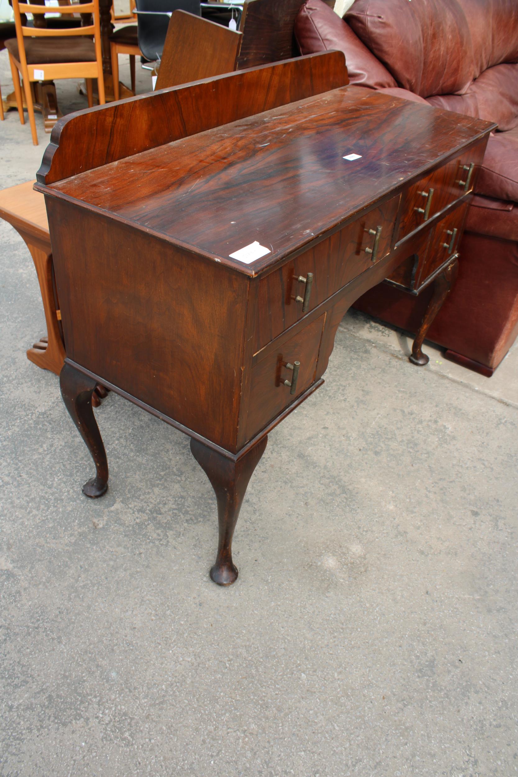 A MID 20TH CENTURY WALNUT KNEEHOLE DRESSING TABLE BASE ON CABRIOLE LEGS, 42" WIDE - Image 2 of 3