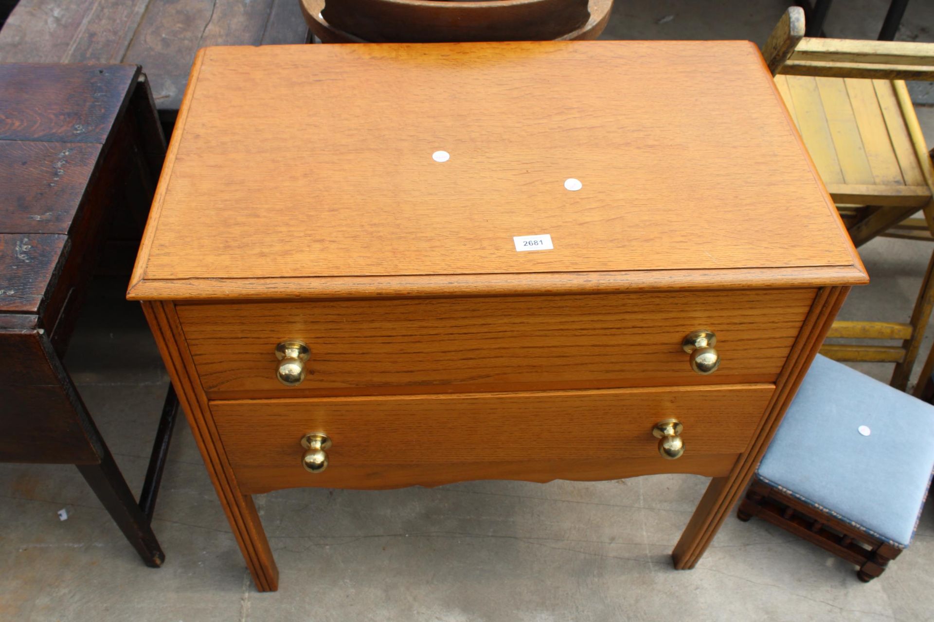 A MID 20TH CENTURY LIGHT OAK CHEST OF TWO DRAWERS, 30" WIDE