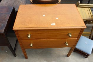 A MID 20TH CENTURY LIGHT OAK CHEST OF TWO DRAWERS, 30" WIDE