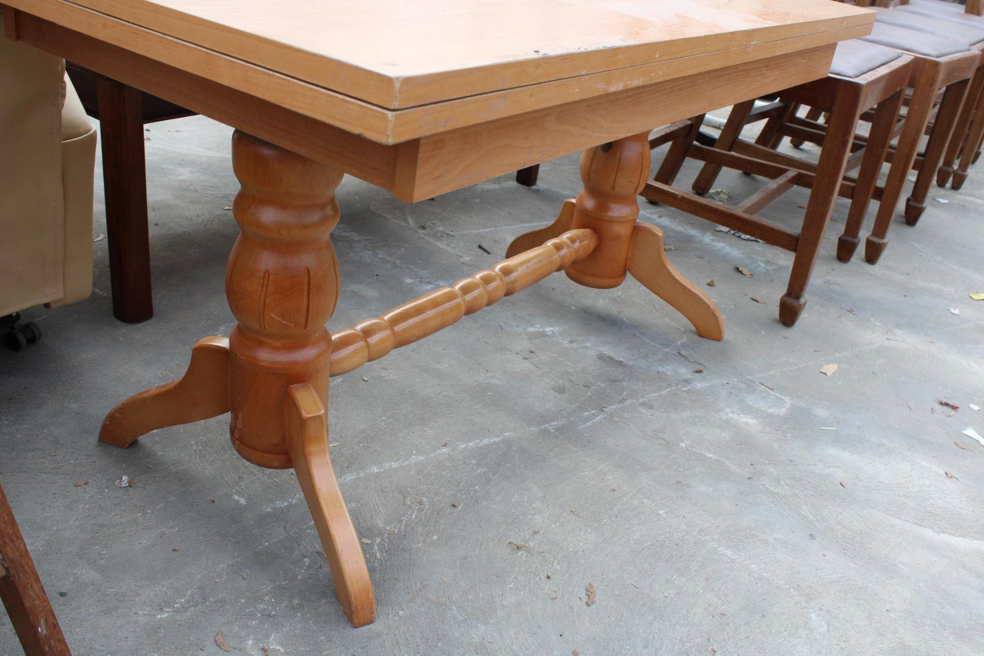 A MODERN LOW TABLE ON PEDESTAL COLUMNS WITH FOLD-OVER TOP - Image 2 of 2