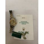 A LADIES' BI-METAL ROLEX DATEJUST WRISTWATCH WITH TAGS AND CARD