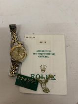 A LADIES' BI-METAL ROLEX DATEJUST WRISTWATCH WITH TAGS AND CARD