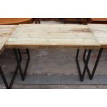 A RUSTIC FOUR PLANK TABLE, 47" X 27" ON METAL LEGS