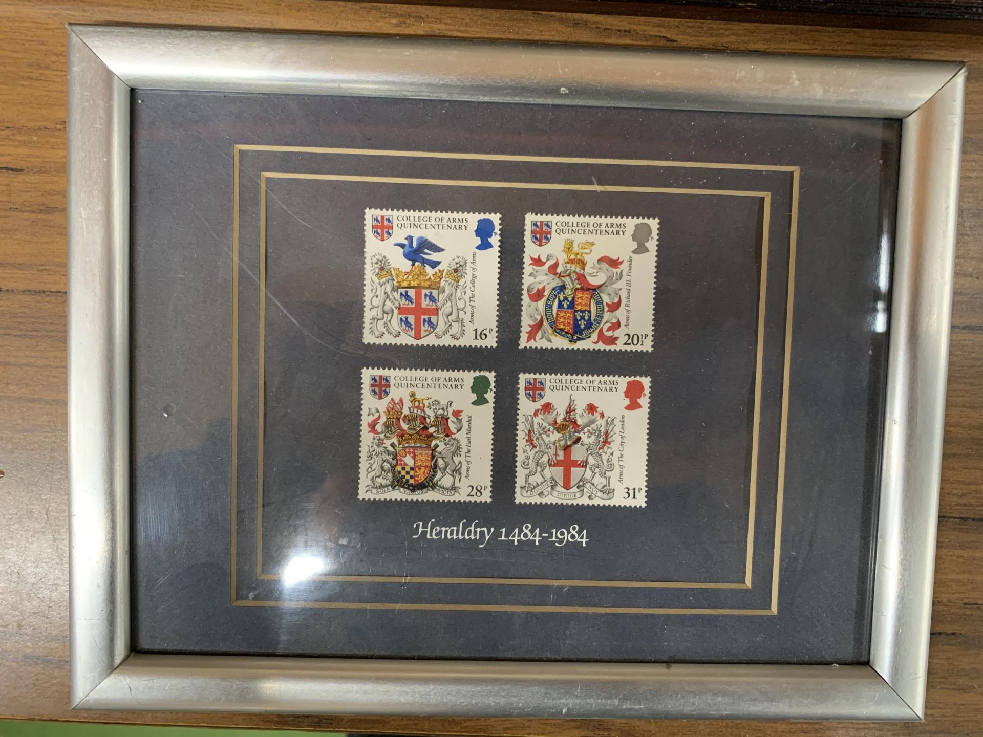 TWO FRAMED FAMILY HISTORY DOCUMENTS FOR THE NAME 'ELKINS' PLUS A SET OF FOUR HERALDRY STAMPS - Image 4 of 4