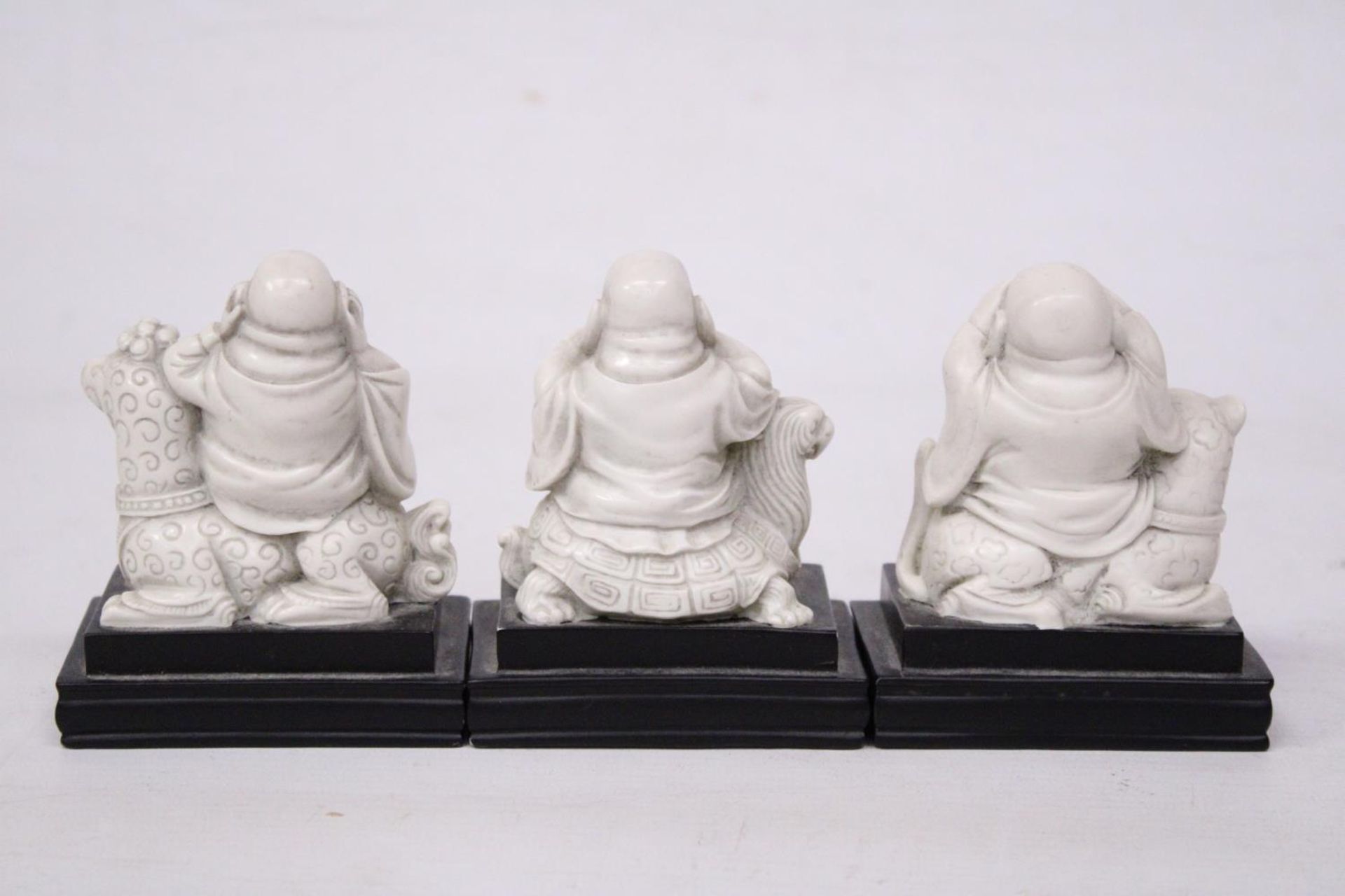 A SET OF BUDDAH FIGURES ON WOODEN PLINTHS - SEE, HEAR AND SPEAK NO EVIL - Image 3 of 5