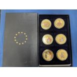 A SET OF SIX LIMITED EDITION GOLD PLATED COINS DEPICTING POPE IN 2014 BY THE EU COMMISSION AND THE